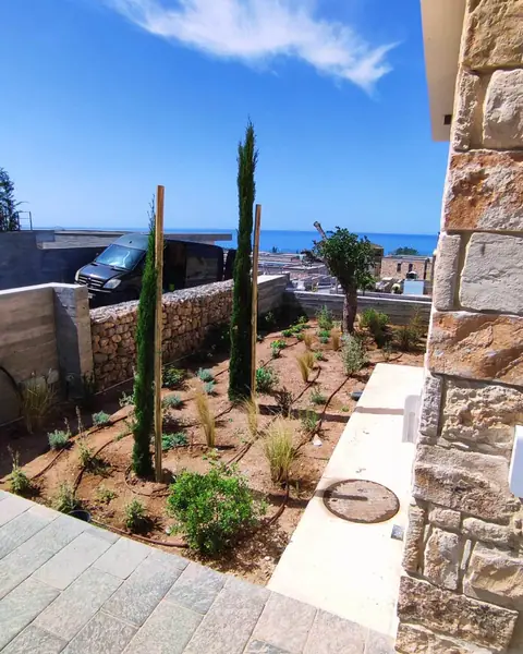 A private garden designed by Antoine Garden Designer, Paphos — its irrigation in view