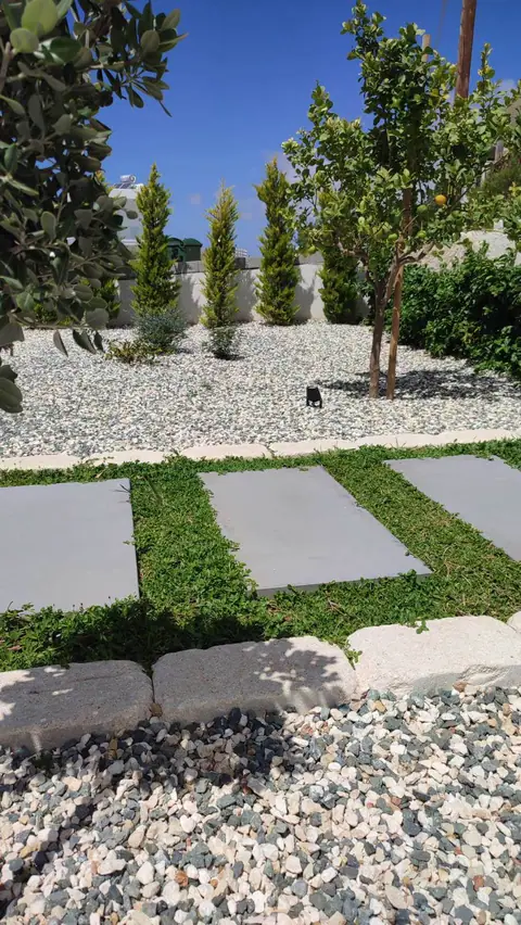A communal garden designed by Antoine Garden Designer, Paphos — paths