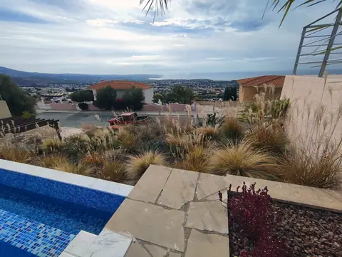 A private garden designed by Antoine Garden Designer, Paphos — grasses, pools & sea