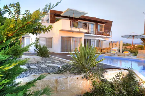 A private garden designed by Antoine Garden Designer, Paphos — paths, pools & sea