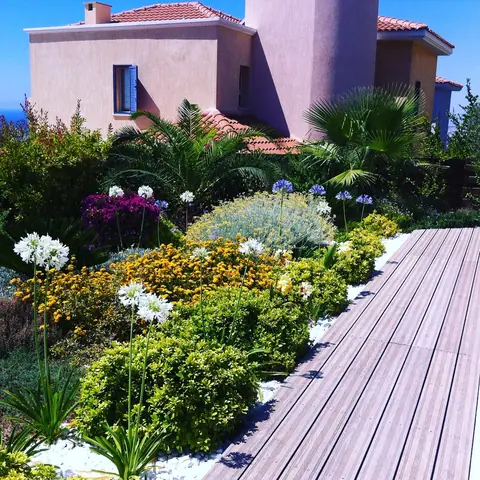 A private garden designed by Antoine Garden Designer, Paphos — paths, flowers